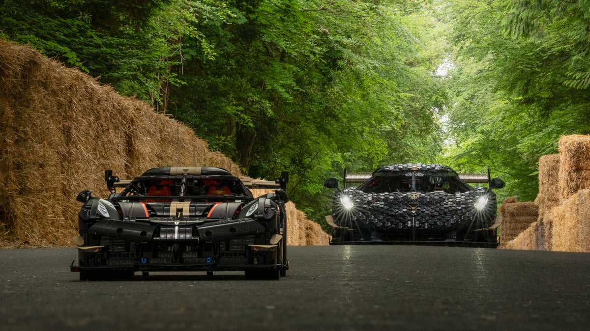 Life-size LEGO Technic Koenigsegg on the Goodwood hillclimb route beside the real Koenigsegg Sadair's Spear